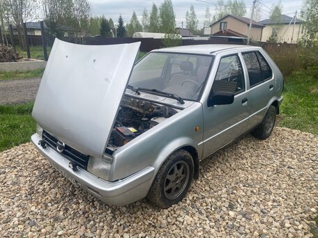 1990 Nissan Micra I (K10), серебристый, 120000 рублей, вид 4