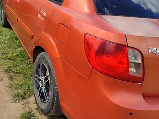 2010 Kia Rio II Рестайлинг, оранжевый, 500000 рублей, вид 3