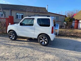 2012 Suzuki Jimny Kei car III Рестайлинг 2, белый, 1050000 рублей, вид 5