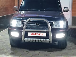 2001 Toyota Land Cruiser 105 100 Series, красный, 2500000 рублей, вид 3