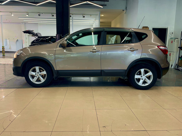 2011 Nissan Qashqai I Рестайлинг, коричневый - вид 1