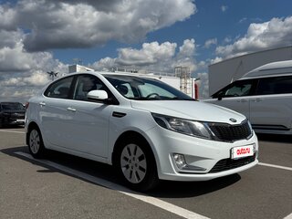 2014 Kia Rio 6-speed III, белый, 1035000 рублей, вид 3