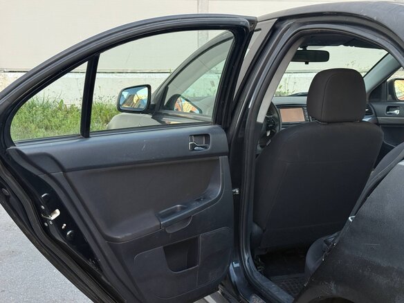 2007 Mitsubishi Lancer X, чёрный - вид 8
