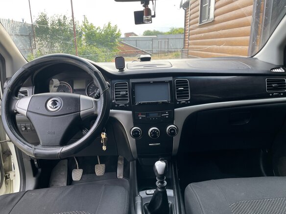 2013 SsangYong Actyon II, белый, 900000 рублей - вид 10