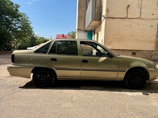 2007 Daewoo Nexia I, бежевый, 330000 рублей, вид 2