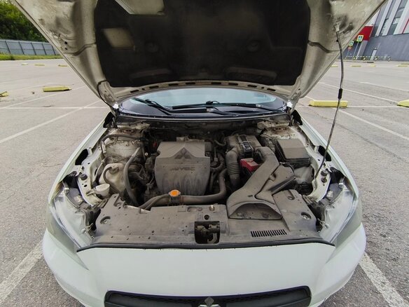 2010 Mitsubishi Lancer X, белый, 750000 рублей - вид 8