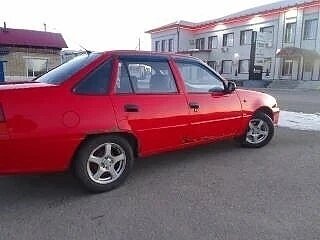 2012 Daewoo Nexia I Рестайлинг, красный, 65000 рублей, вид 1