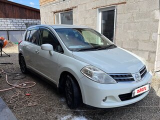 2011 Nissan Tiida I, белый, 650000 рублей, вид 2