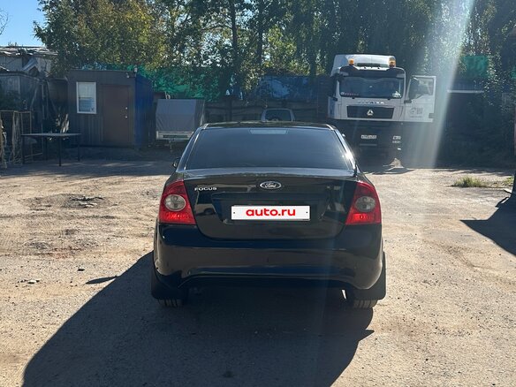 2010 Ford Focus II Рестайлинг, чёрный - вид 1