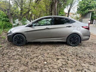 2011 Hyundai Solaris I, серый, 590000 рублей, вид 4