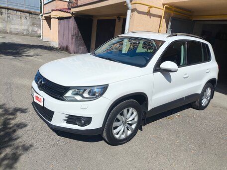 2016 Volkswagen Tiguan I Рестайлинг, белый, 1450000 рублей, вид 1