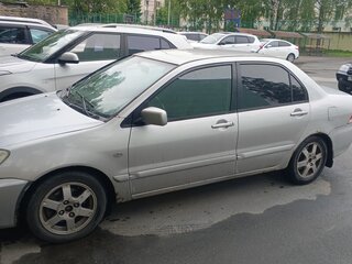 2005 Mitsubishi Lancer IX Рестайлинг, серебристый, 180000 рублей, вид 2
