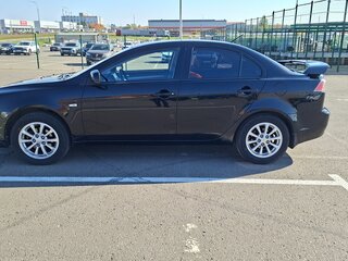 2010 Mitsubishi Lancer X, чёрный, 629000 рублей, вид 2