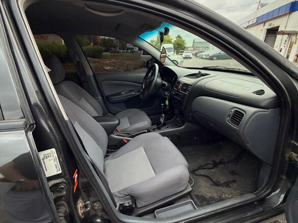 2004 Nissan Almera II (N16) Рестайлинг, чёрный - вид 16