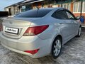 2015 Hyundai Solaris I Рестайлинг, серебристый, 750000 рублей - вид 3