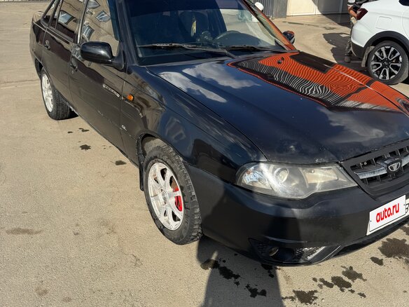 2011 Daewoo Nexia I Рестайлинг, чёрный - вид 2