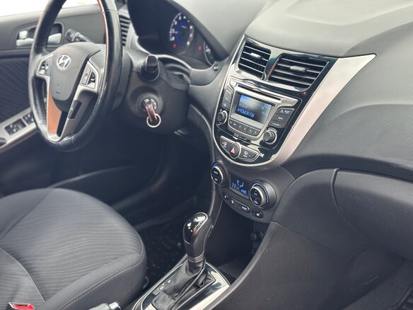 2014 Hyundai Solaris I Рестайлинг, коричневый, 950000 рублей - вид 8