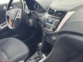 2014 Hyundai Solaris I Рестайлинг, коричневый, 950000 рублей - вид 8
