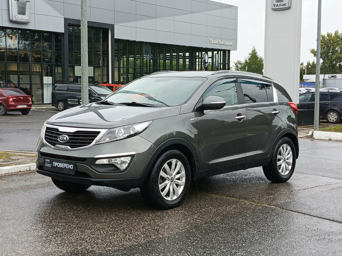 Открыть фотографии: Kia Sportage III