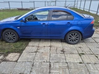 2011 Mitsubishi Lancer X Рестайлинг, синий, 595000 рублей, вид 3