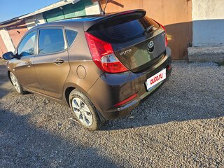 2015 Hyundai Solaris I Рестайлинг, коричневый, 950000 рублей, вид 3
