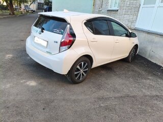 2017 Toyota Aqua I Рестайлинг, белый, 920000 рублей, вид 4