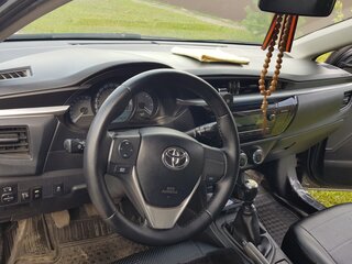 2013 Toyota Corolla XI (E160, E170, E180), серебристый, 1100000 рублей, вид 5