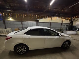2016 Toyota Corolla XI (E160, E170, E180), белый, 1400000 рублей, вид 2