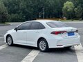 2022 Toyota Corolla XII (E210) Рестайлинг, белый - вид 4