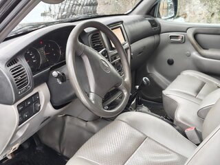 2003 Toyota Land Cruiser 100 Series Рестайлинг 1, чёрный, 1730000 рублей, вид 4