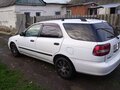 2000 Suzuki Cultus III Рестайлинг, белый - вид 3
