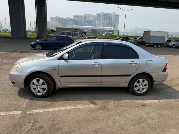 2004 Toyota Corolla IX (E120, E130), серебристый, 510000 рублей - вид 1