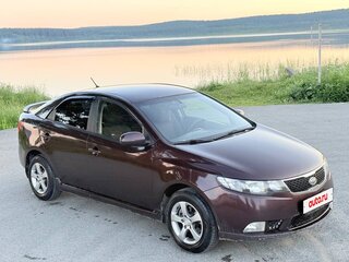 2010 Kia Cerato 6-speed II, красный, 600000 рублей, вид 4