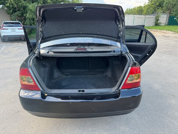 2006 Toyota Corolla IX (E120, E130) Рестайлинг, чёрный, 419000 рублей - вид 7