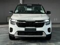 2026 Kia Seltos I Рестайлинг, белый - вид 1