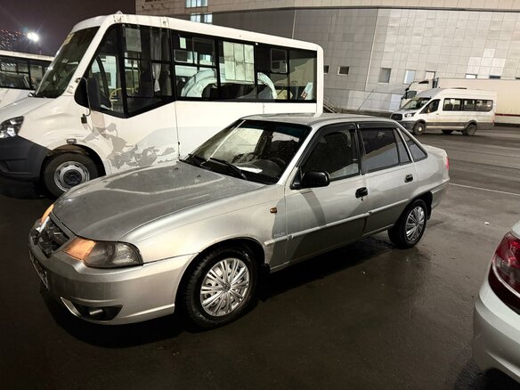 2010 Daewoo Nexia I Рестайлинг, серебристый, 165000 рублей - вид 2
