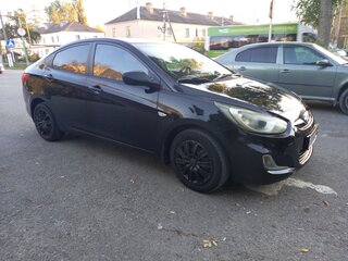 2012 Hyundai Solaris I, чёрный, 599000 рублей, вид 2