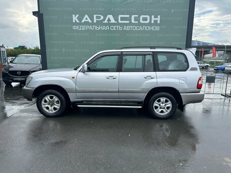 2006 Toyota Land Cruiser 100 Series Рестайлинг 2, серебристый, 2125000 рублей, вид 3