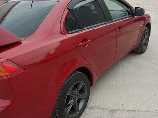 2008 Mitsubishi Lancer X, красный, 660000 рублей, вид 2