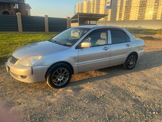 2009 Mitsubishi Lancer IX Рестайлинг, серебристый, 350000 рублей, вид 2