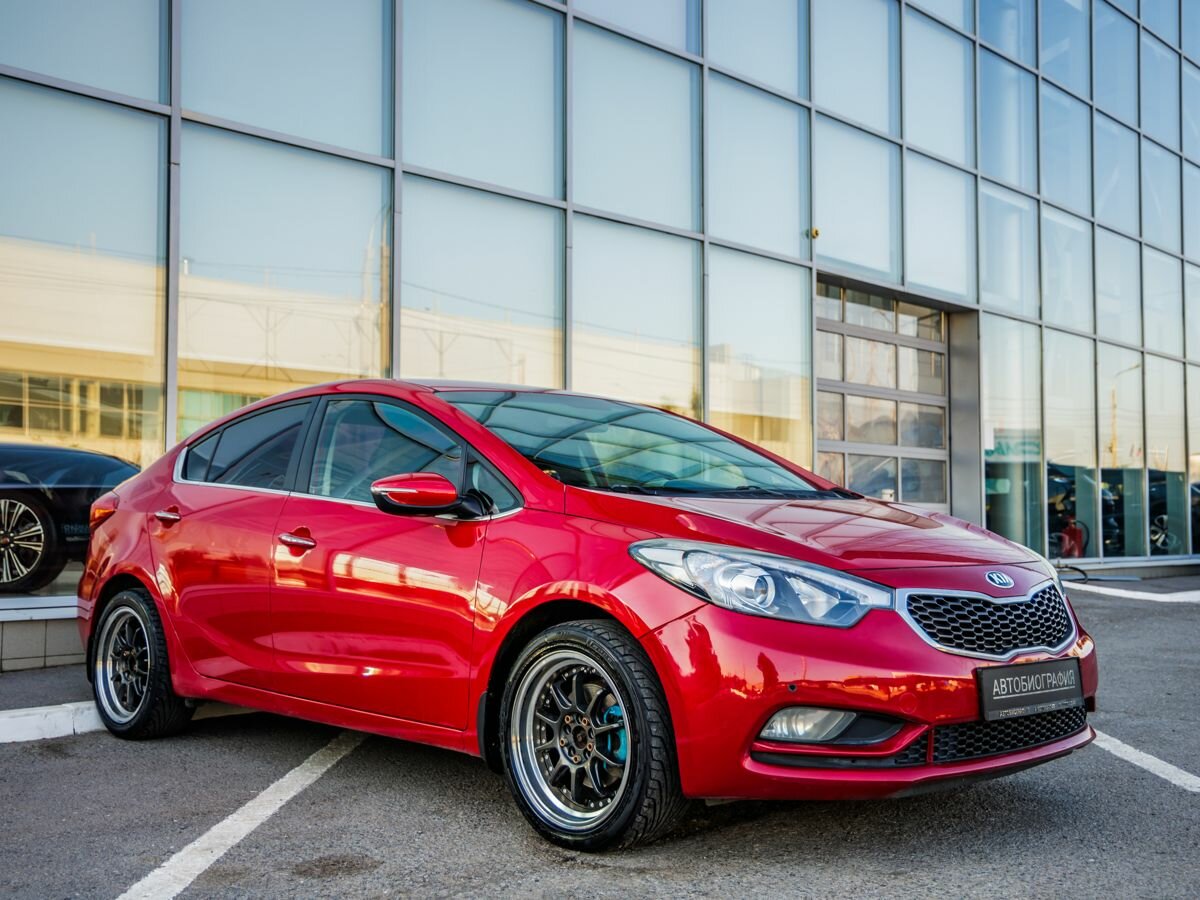 Открыть фотографии: Kia Cerato III