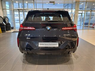 2025 BMW X3 Long 30L xDrive IV (G45/G48), чёрный, 7250000 рублей, вид 4