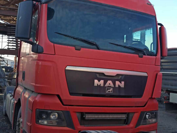 2012 MAN TGX, красный, 2755000 рублей - вид 2