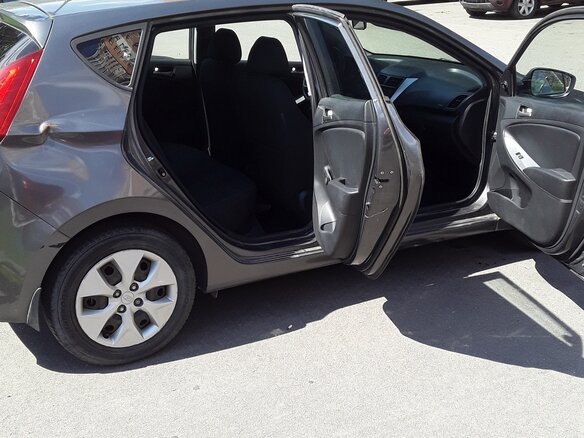 2014 Hyundai Solaris I Рестайлинг, серый - вид 1