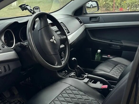 2010 Mitsubishi Lancer X, чёрный, 550000 рублей - вид 6