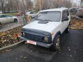 2011 Lada (ВАЗ) 2121 (4x4) I Рестайлинг, белый, 400000 рублей - вид 1