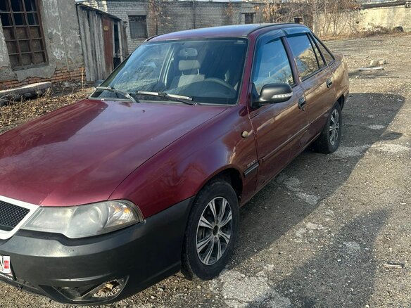 2012 Daewoo Nexia I Рестайлинг, красный, 100000 рублей