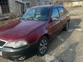2012 Daewoo Nexia I Рестайлинг, красный, 100000 рублей