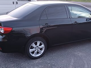 2010 Toyota Corolla X (E140, E150), чёрный, 955000 рублей, вид 5
