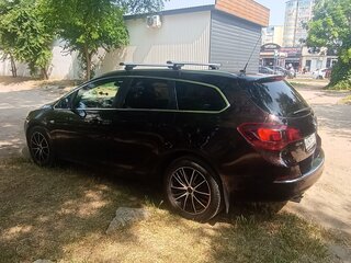 2014 Opel Astra J Рестайлинг, коричневый, 950000 рублей, вид 3